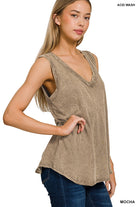 Woman wearing a mocha acid wash tank top on a white background