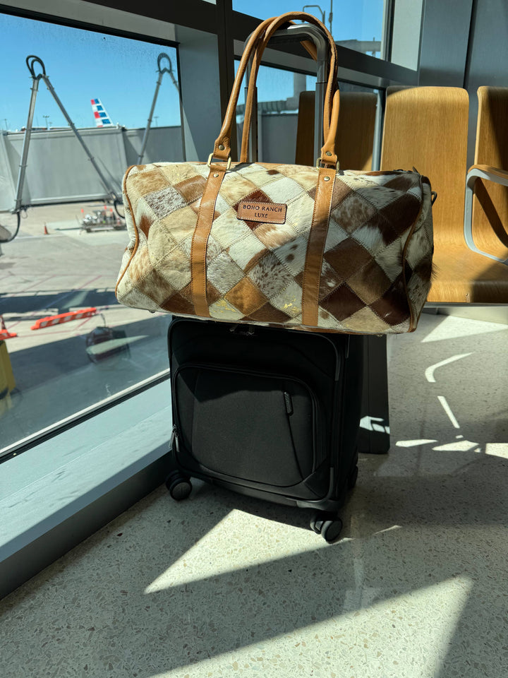 Boho Luxe Cowhide Weekender Bag | Tan + White
