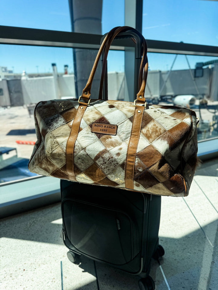 Boho Luxe Cowhide Weekender Bag | Tan + White